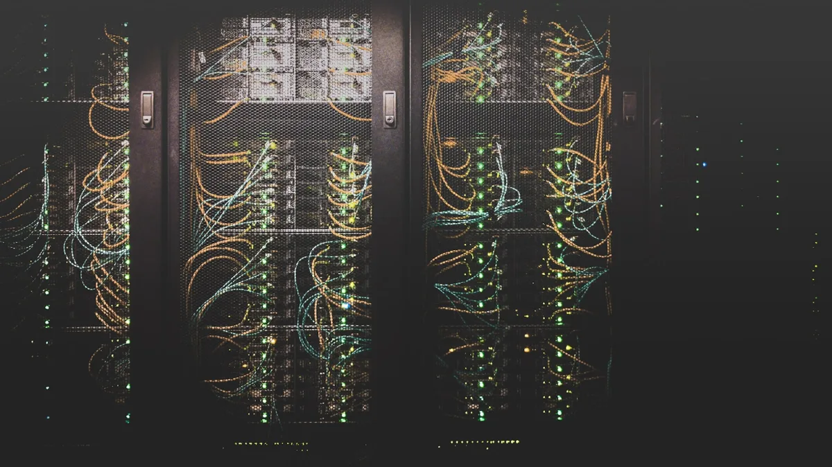 A dark server rack with patch cabling and status LEDs